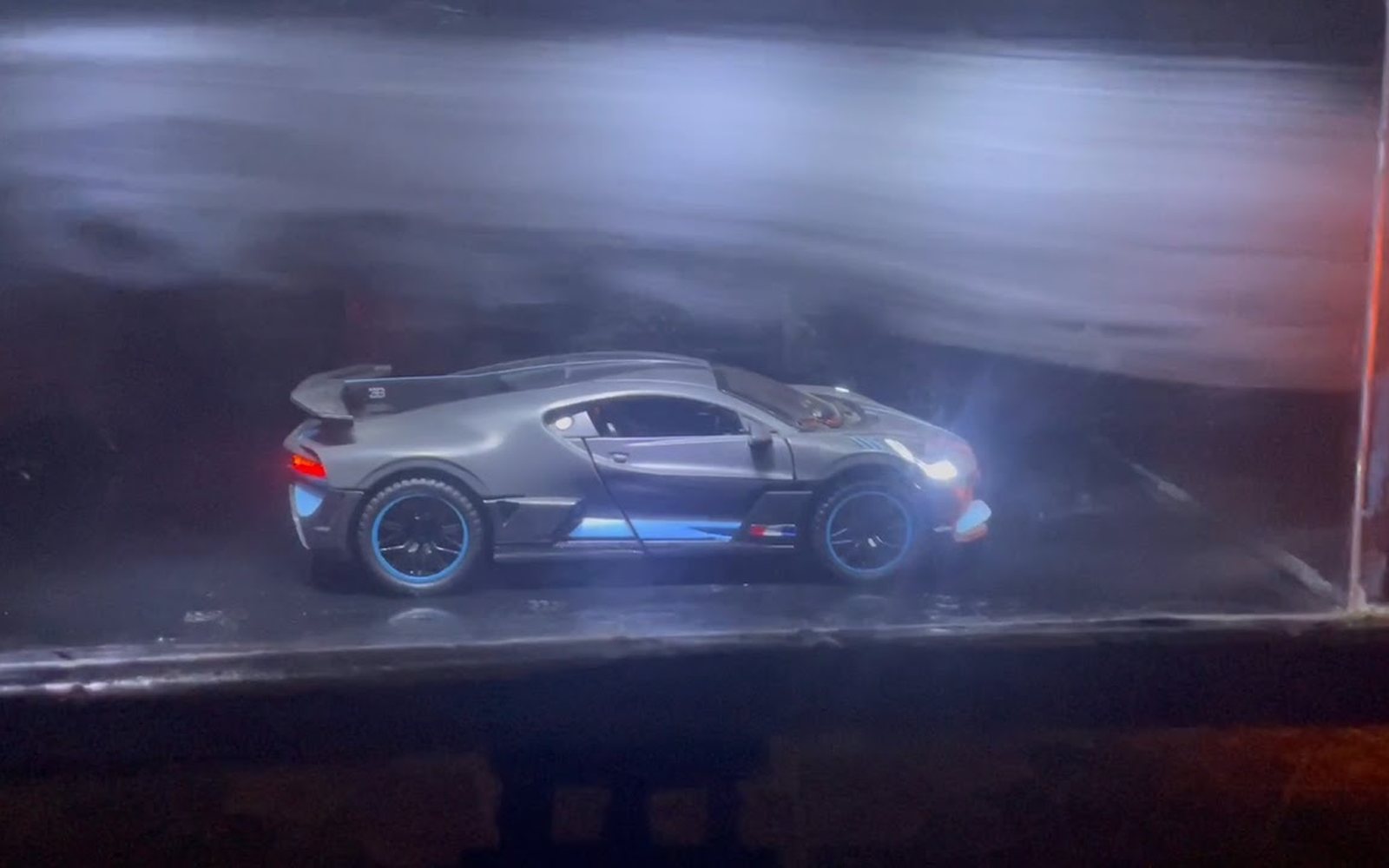 Model car in the Project Sierra desktop wind tunnel with smoke flow